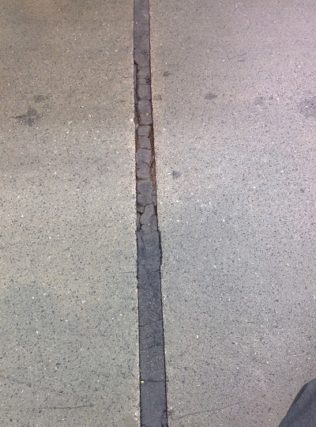 Damaged concrete floor joints